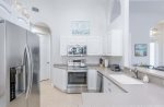 The Kitchen Features Stainless Steel Appliances 